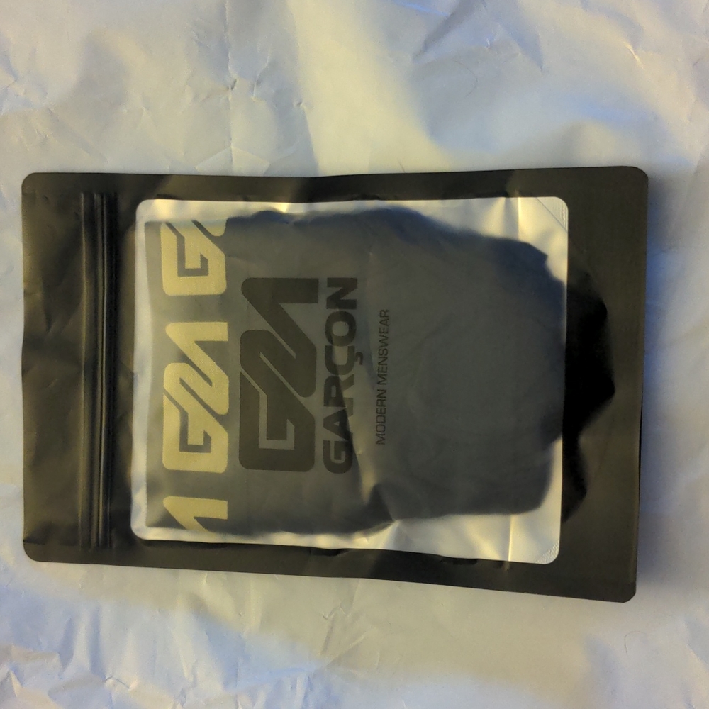 Garçon Model Black Briefs - size small, never opened!